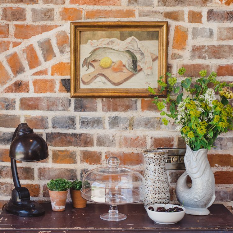 Exposed internal brick work at Kingshill farmhouse on the Elmley Nature Reserve. Interior design & styling by Rowan Plowden Design.